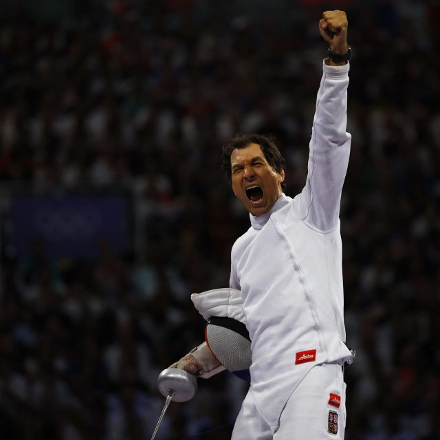 Jiří Beran slaví na závěr své kariéry olympijský bronz | foto: Albert Gea,  Reuters